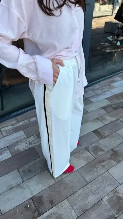 Білі штани палаццо на резинці