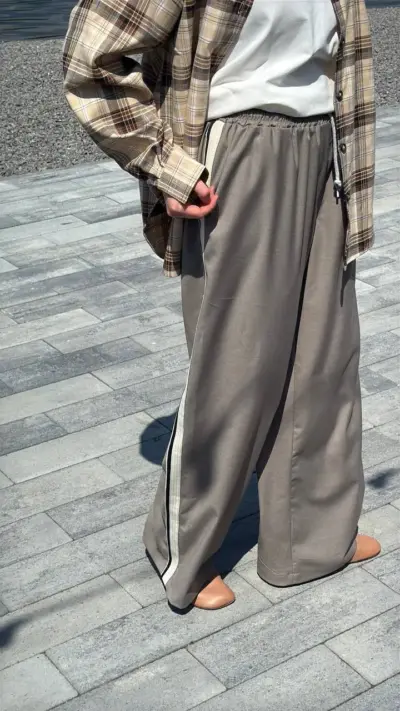 Бежеві штани палаццо на резинці