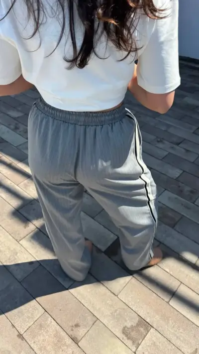 Штани палаццо на резинці світло-сірі в смужку