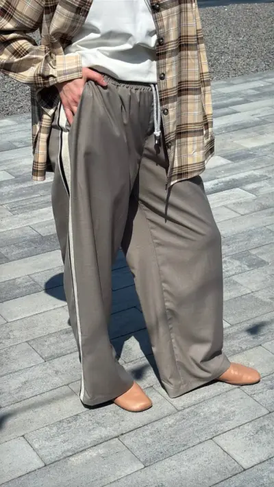 Бежеві штани палаццо на резинці