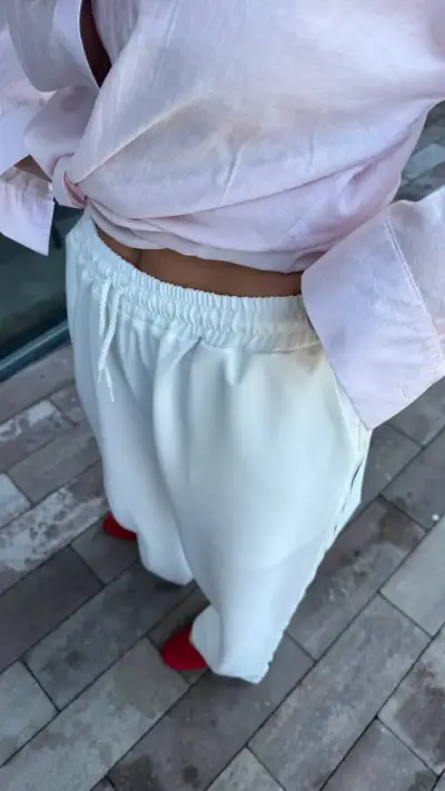 Білі штани палаццо на резинці